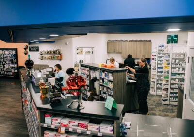 Employees working at pharmacy store